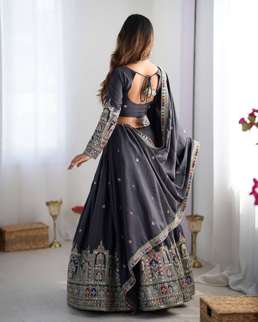 Majestic Midnight Black Designer Lehenga Choli Featuring Intricate Multicolored Architectural Embroidery and Mirror Work